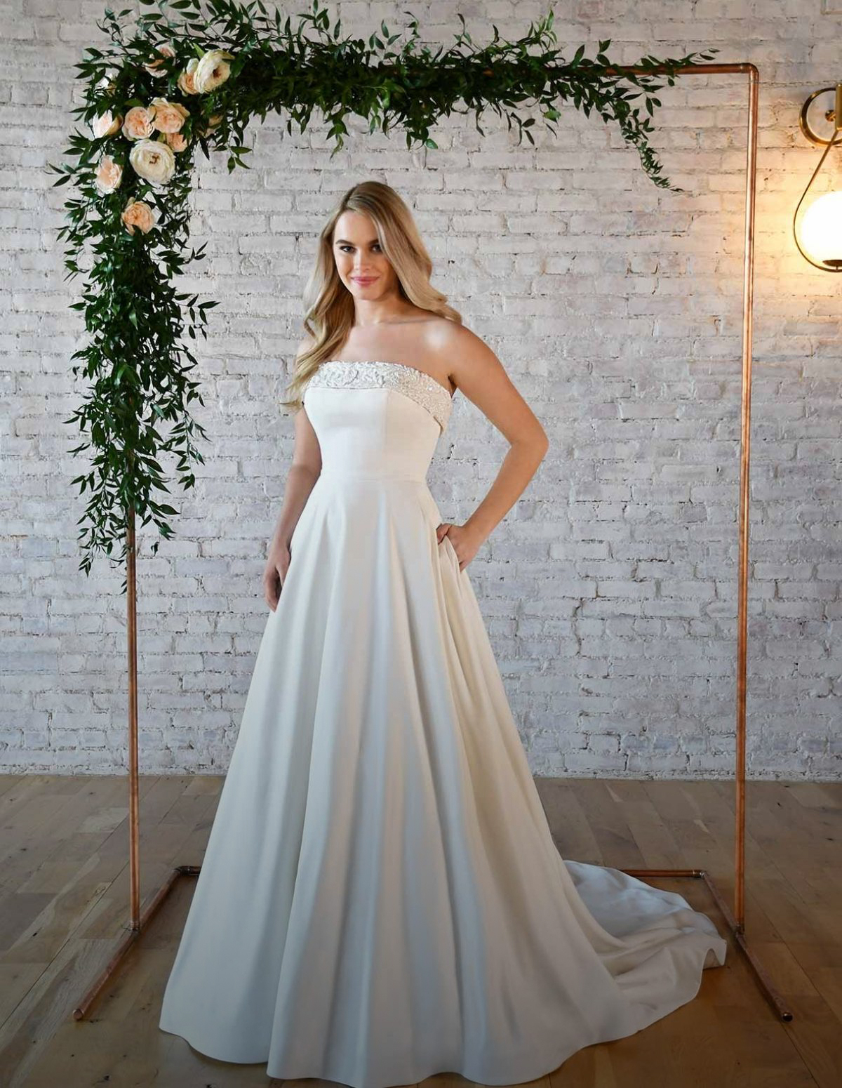 Model wearing a Downtown Gowns Bridal Collection Gown